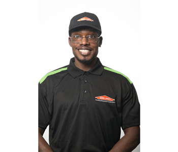 male portrait, black servpro hat, glasses