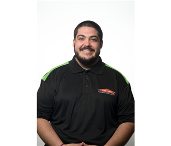 smiling male small black beard and shirt